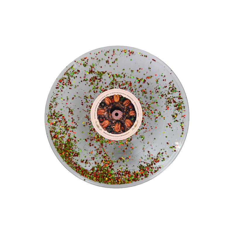 Sabrina Carpenter - Vinilo Fruitcake disco líquido lleno de purpurina verde y roja